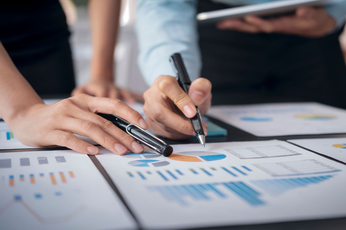 Editing a poster of a chart with a pen